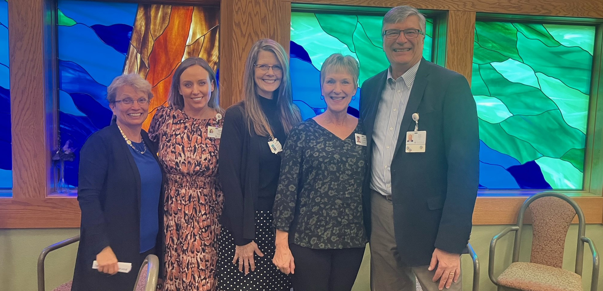 Sandy, Aubrey, KathyAnn, Laura and Bob smile for a picture